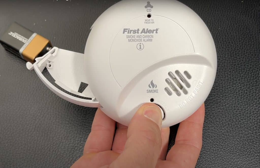 Smoke detector reset button